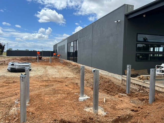 The water-feature channel after excavation and initial steel installation.